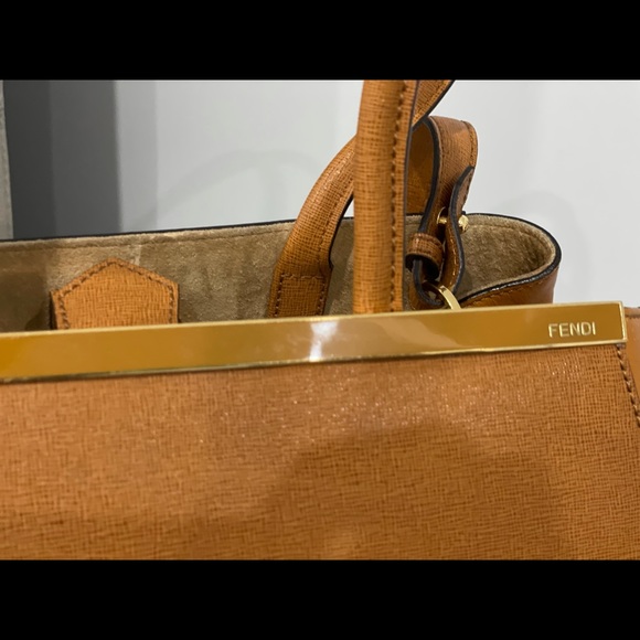 Fendi First Brown Shearling Sheepskin Shoulder Bag w/ Gold  Fendi handbag,excellent condition. Great for fall season.Dust bag included.